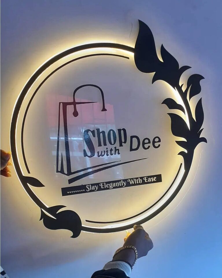 Cut-out 2D logo board with leaf frame and halo light